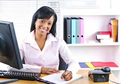 A title agent sits at her desk
